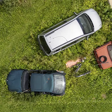 Old and unused vehicles sitting in a yard ready to be sold for cash. We help you sell your junk car quickly with free removal, instant cash offers, and a hassle-free process. Turn unwanted, abandoned, or non-running cars into cash with reliable junk car buyers.